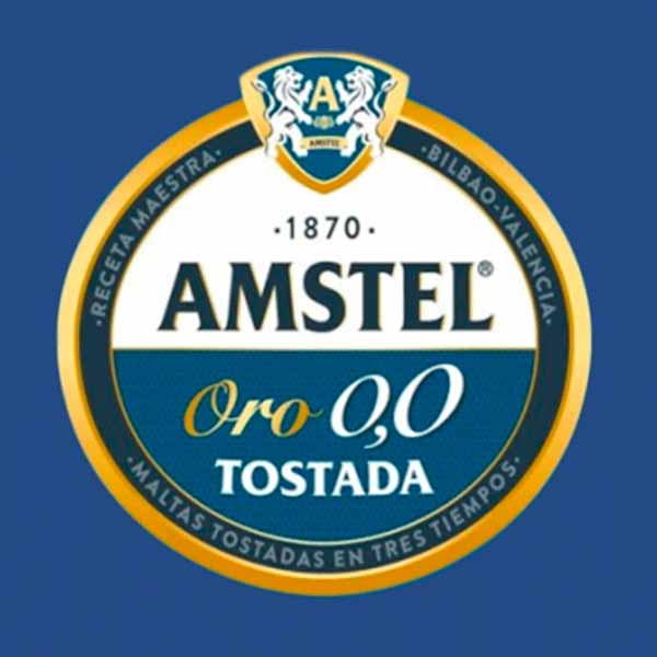 Botella de cerveza Amstel Oro 0,0 servida en el Museo del Jamón.